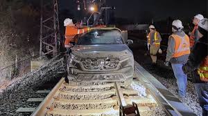 SUV Driver’s Joyride on New York Railroad Tracks Ends in Fire