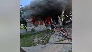 Child Jumps From Blaze Into Officer’s Arms