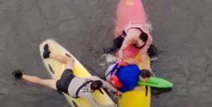 Suspect Flees Into River Paddleboard Chase